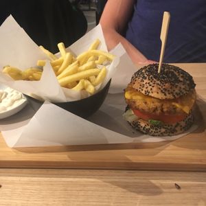Burger served with french fries at Waku Waku in Utrecht