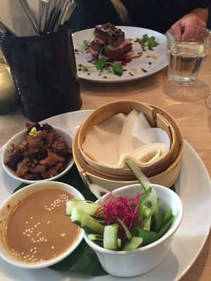 Vegan duck rolls and tofu fried with maple syrop, great starter! at Waku Waku in Utrecht
