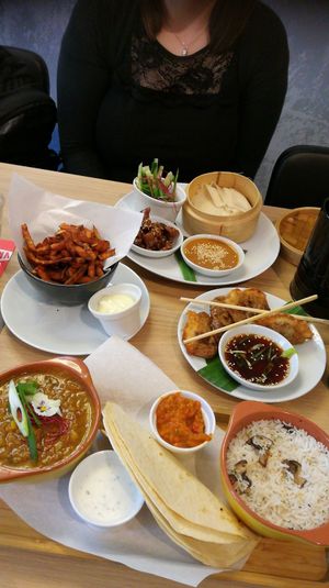 (From top to bottom:) peking luck, sweet potato fries, gyoza vietnam style, curry of the day. at Waku Waku in Utrecht