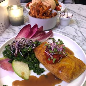 Smoked tofu roll and sweet potato fries. at Waku Waku in Utrecht