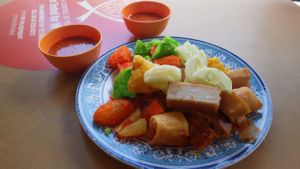 Mantou mezze with satay rice block and bean curd at Southern Palace in East Singapore