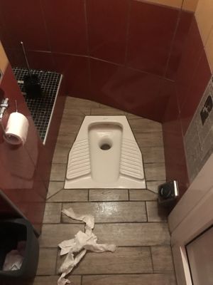 their all-gender toilet at Pizza AM  in Milan