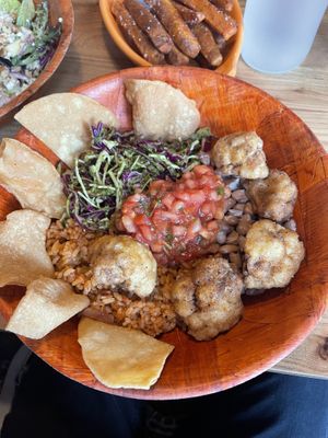 Cauliflower bowl (and sweet potato fries) 🔥  at Owl Sprit in Port Townsend