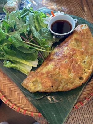 Bánh Xèo – Turmeric Crêpe
Organic tofu and Shiitake mushroom with mung bean, bean sprouts folded into a crisp rice flour, coconut milk, turmeric crêpe, etc. at Anh and Chi in Vancouver