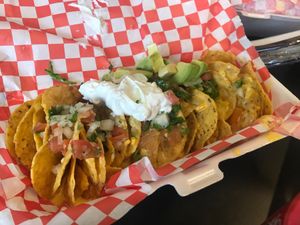 Nachos were delicious with generous cheesy sauce. They were out of chili topping that day. I’d ask for cheese sauce on the side next time, so the chips would be crispy until the last bite. at Da Munchies in Dallas