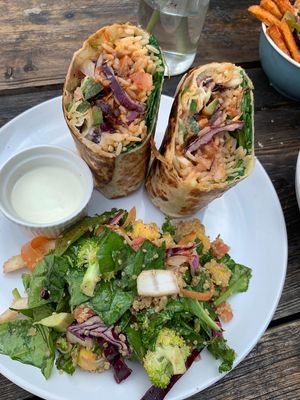 Banging jackfruit burrito with garlic aioli. Yes x a million. I asked for their soul salad on the side but you can have chips. at Love Shack in East London