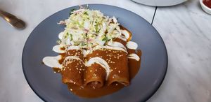 Sweet potato enchiladas with banana mole. Photo taken at brunch in March 2019. at Rosalinda in Toronto