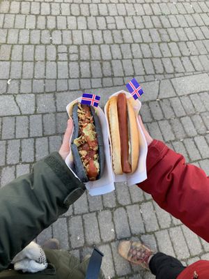 Vegan volcanic dog (left) and regular grilled hot dog (right)  at Akureyri Hot Dog Stand in Akureyri