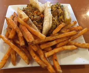 Grilled Seitan Steak w/ Cajun Fries at More Life Cafe in Jersey City