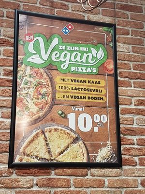 vegan pizza add at Domino's Pizza in Bruges