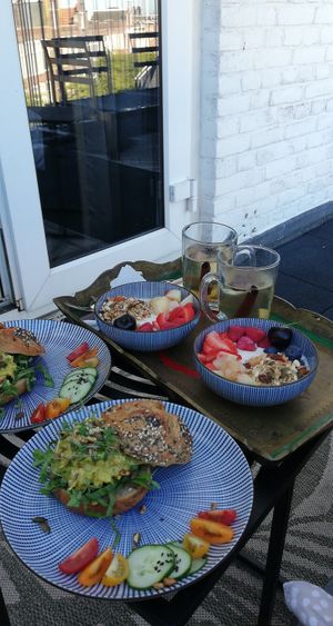 Delicious vegan breakfast, buns with no-chicken salad and yoghurt bowls with home made granola at Vegan B&B Valkenbos in The Hague