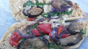 Hummus, roasted maple aubergine peppers and red onions sandwich  at Hive Coffee Company in Jarrow