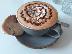 Pride cookie latte (vg) at Hive Coffee Company in Jarrow