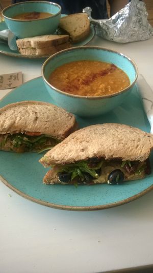 Sweet corn and paprika soup with olive tapenade and vegan chorizo, hummus abs peppers sandwich at Hive Coffee Company in Jarrow