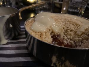 Apple plum crumble with soya custard at The Sheep Heid Inn in Edinburgh