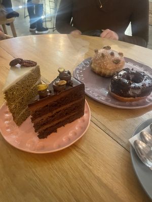 Cakes and doughnuts for a shared dessert  at KAIME in Medellin