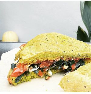 Turmeric organic bread sandwich with sprouts and veggies at NektaR in Crete