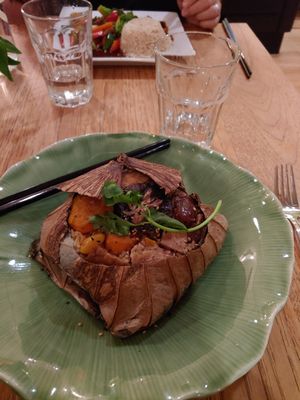 Lotus leaves wrapping Jasmine rice, unique veggies. Steamed, no oil. Delicious. Wish I had a photo of the silken tofu chocolate orange mousse at Green Elephant Vegetarian Bistro in Portland