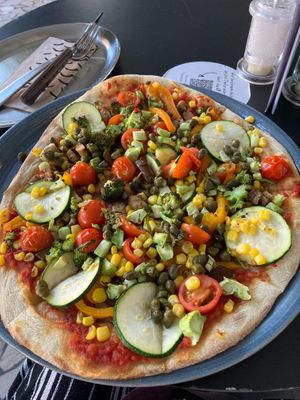 Veggie garden with added broccoli and capers.  at Stripped Pizza - Claraplatz in Basel