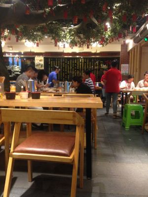 Inside tables at Yang YiMa SiWaWa in Guiyang