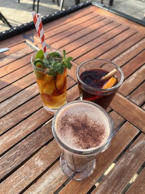 pimm’s cup, warm mold wine, and an almond milk hot chocolate  at The Woodman in North London