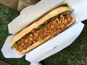 Seitan hot dog with gherkins and crispy onions at Herman ze German - Soho in London