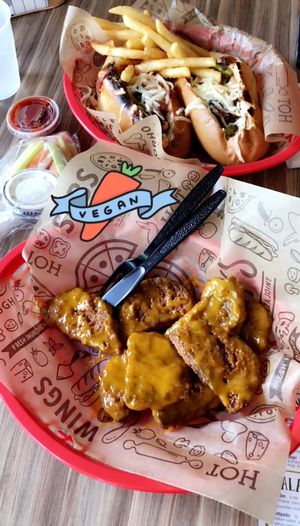 Seitan wings with moonshine sauce and seitan bbq “jack” sandwich  at Spinners Pizza & Subs in Albany