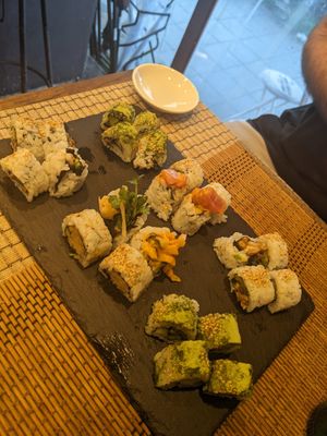 Vegetarian sushi on bottom, non veggie on top at Sushi Roll Double Quotation IKI in Osaka