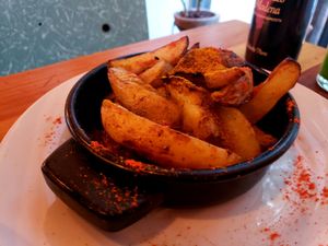potato wedges with skins and pepper. good at La Temeraria in Montevideo