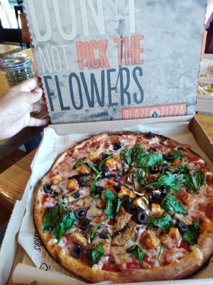 Vegan pizza, veg cheese, veg tofu mock chk pieces, spinach, olives, mushroom, red sauce. at Blaze Pizza in Tracy