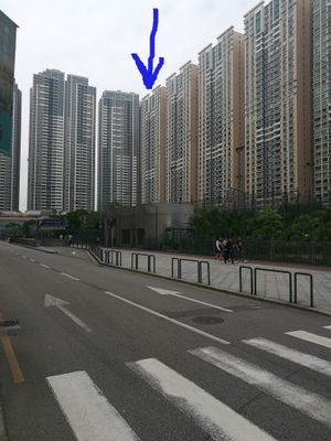 Enter through this residential tower, seen from across Taipa Central Park.
 at Rawlicious in Macau