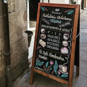 Sandwich board outside. Staff was able to speak English, too. at Hanai Vegana in Barcelona