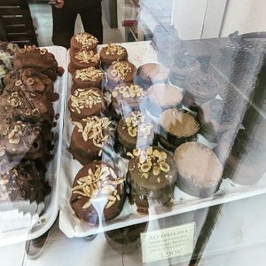 Brownies with different fillings, almonds, hazelnuts, coffee and chocolate. at Hanai Vegana in Barcelona