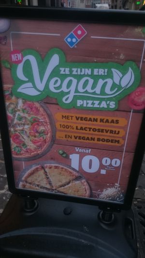 The one at the Oude Markt - Vegan advertisment at Domino's Pizza in Leuven