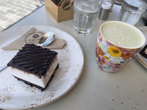 Cake and matcha latte at Crumb in Crete