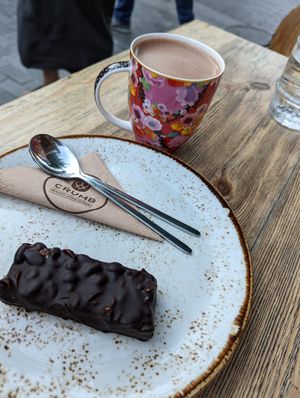 Vegan snickers bar and vegan hot chocolate at Crumb in Crete