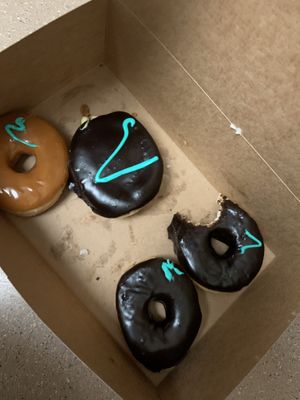 Maple, Boston cream and chocolate. Forgot to take a picture of the glaze lol  at Rebel Donut - Coors Blvd in Albuquerque