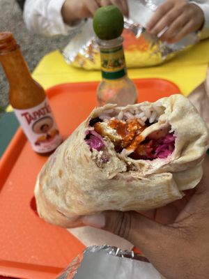 Namaste burrito with some hot sauce  at Joey's Joint in Eastham