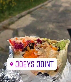 Pot head burrito! Baked sweet potato, carrot cabbage slaw, pico de gallo, guac, rice and beans, and a vegan chipotle aioli! at Joey's Joint in Eastham