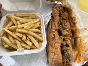 Seasoned fries and Philly  at Dina's Vegan Deli & Desserts in West Palm Beach