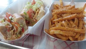 Jackfruit toona sandwich and cheeze fries at Dina's Vegan Deli & Desserts in West Palm Beach
