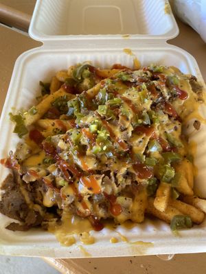 philly fries are always a hit 💕  at Dina's Vegan Deli & Desserts in West Palm Beach