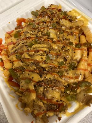 Philly fries 🍟   at Dina's Vegan Deli & Desserts in West Palm Beach