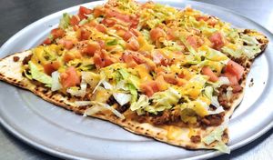 TACO PIZZA at Dina's Vegan Deli & Desserts in West Palm Beach