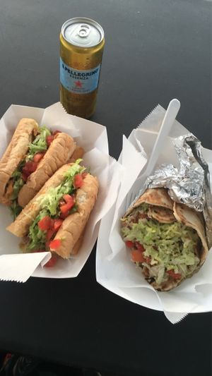 Cheesesteak with tomato/lettuce and the boardwalk gyro!!! Absolutely delicious 😋 at Dina's Vegan Deli & Desserts in West Palm Beach