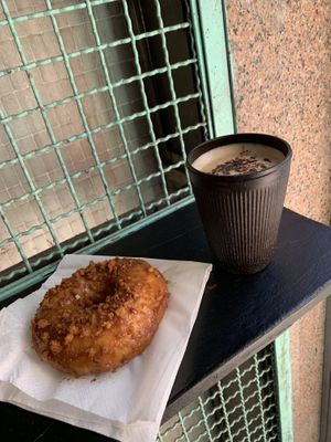 Biscoff donut and soy latte   at DUH Vegan in Porto