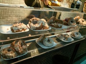 Donuts display at DUH Vegan in Porto