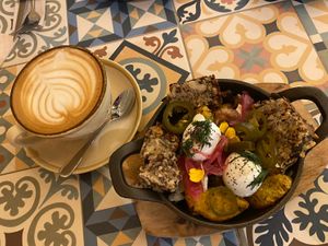 Alps brunch and cappuccino with oat milk  at EatMyTrip  in Barcelona