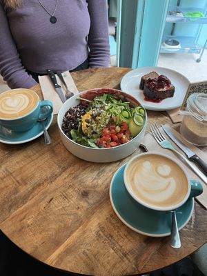 coffee, bowl with black rice, banana bread  at EatMyTrip  in Barcelona