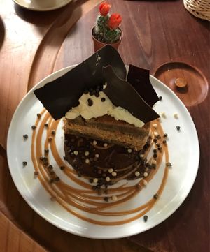 banana bread with peanut butter ice cream and vegan whipped cream! at EatMyTrip  in Barcelona